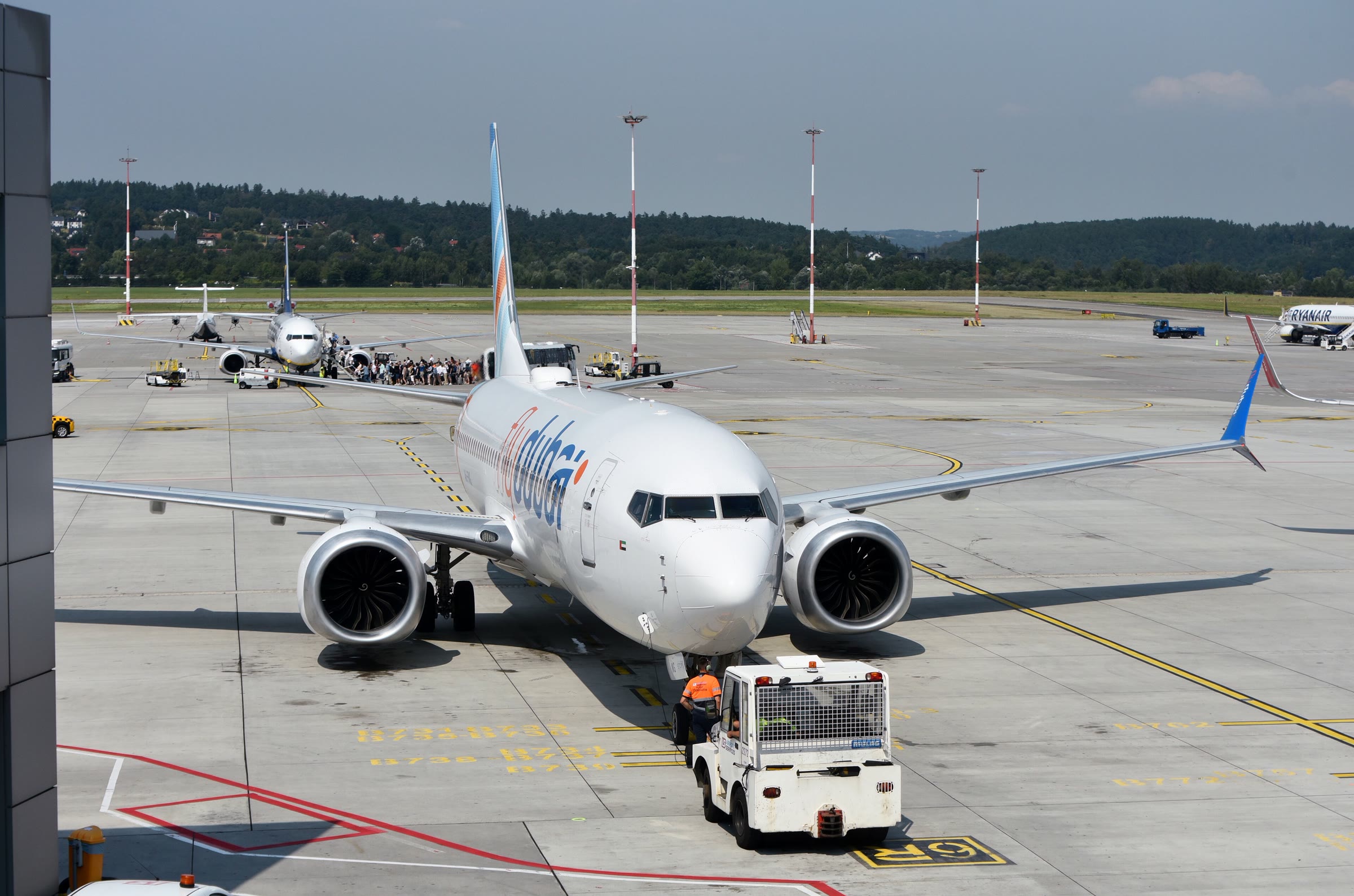 A flydubai Boeing 737-8 MAX taxis at Kraków John Paul II International Airport in August 2024.